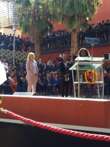 Dr Jill Biden waits at a podium to be introduced